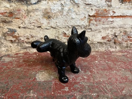 urinating dog doorstop